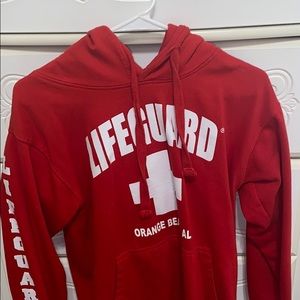 red lifeguard sweatshirt